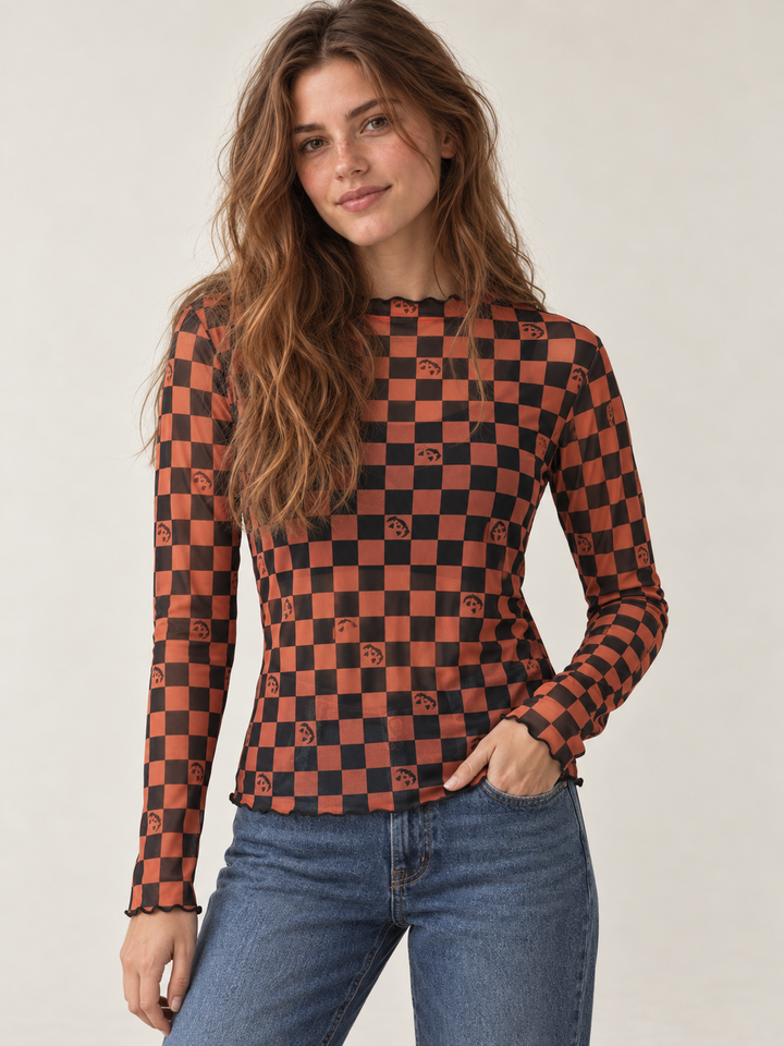 Halloween Sheer Long Sleeve Checkered Pumpkin top - front view on model