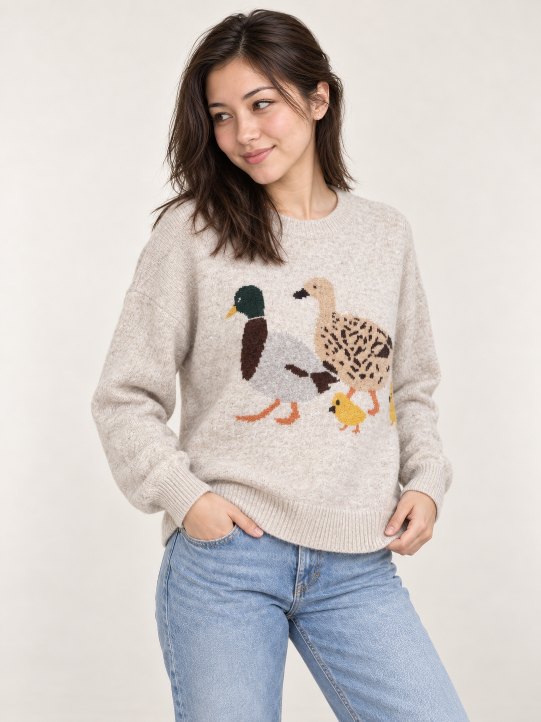 Duck Family Sweater Taupe – angled view on model