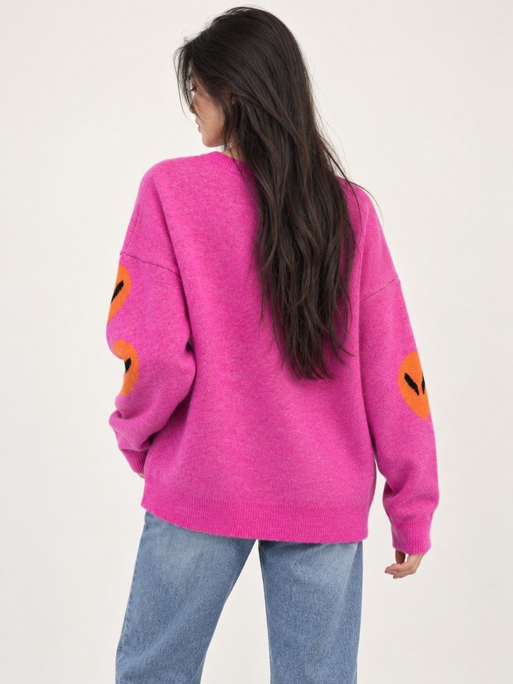 Model wearing Alien Sweater Pink — back view