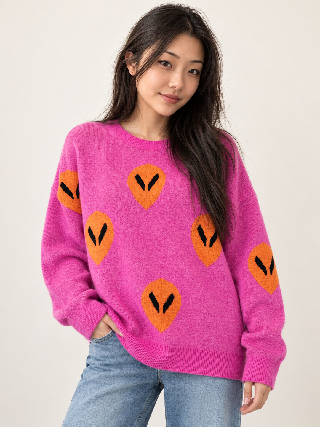 Model wearing Alien Sweater Pink — front view