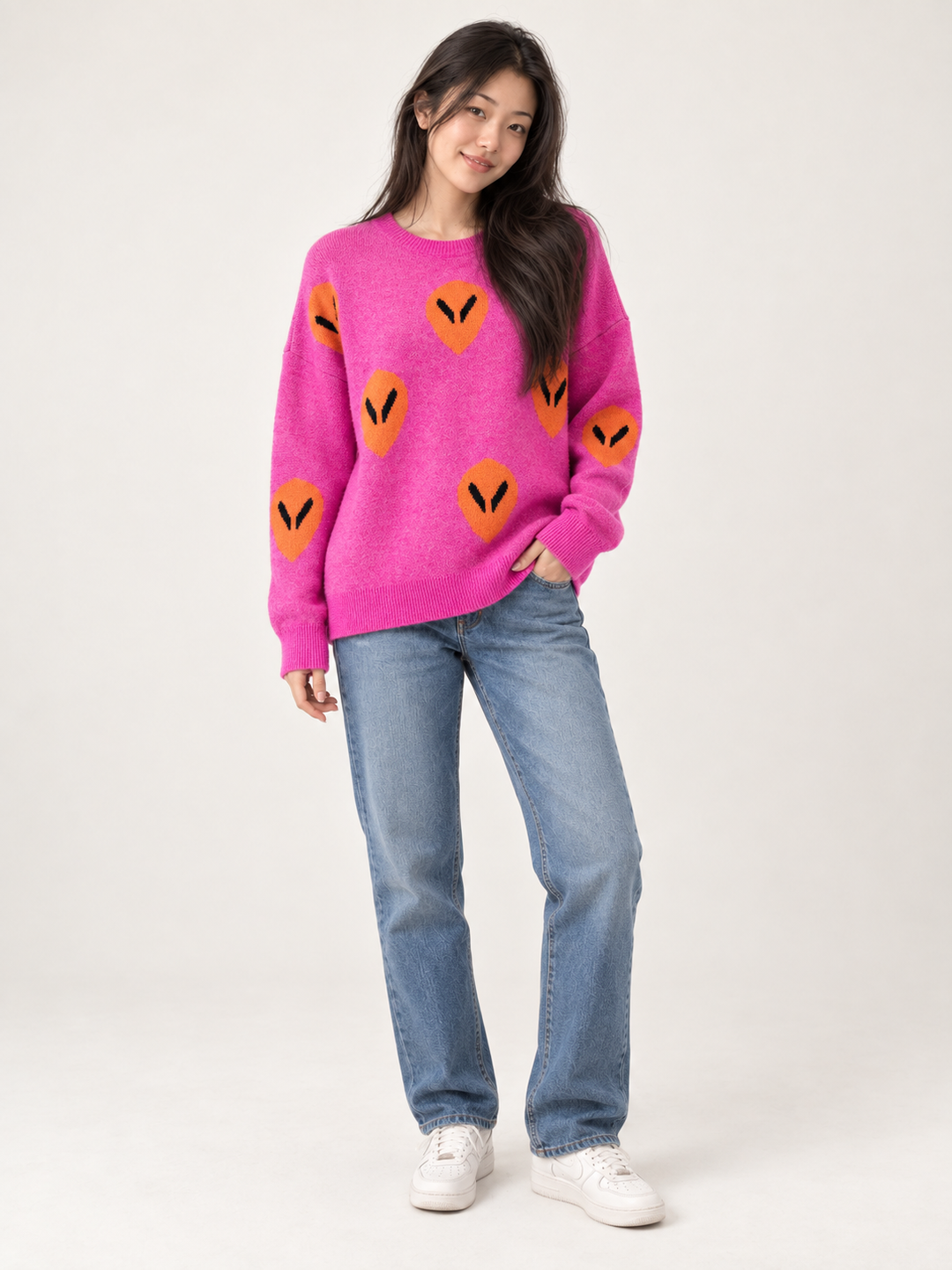 Model wearing Alien Sweater Pink — full-body front view