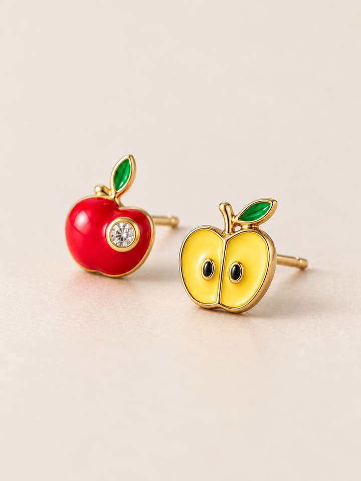 Apple Stud Earrings shown angled on a warm neutral background