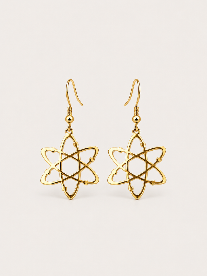 Gold Atom Drop Earrings shown on a warm neutral background