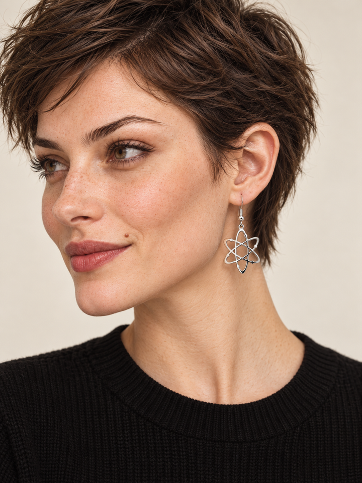 Silver Atom Drop Earrings worn on a model