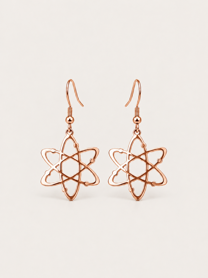 Rose Gold Atom Drop Earrings shown on a warm neutral background