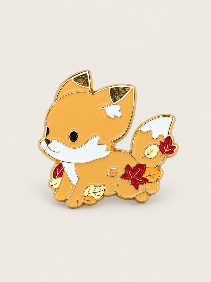 Autumn Fox with Leaves Pin shown on a warm neutral background