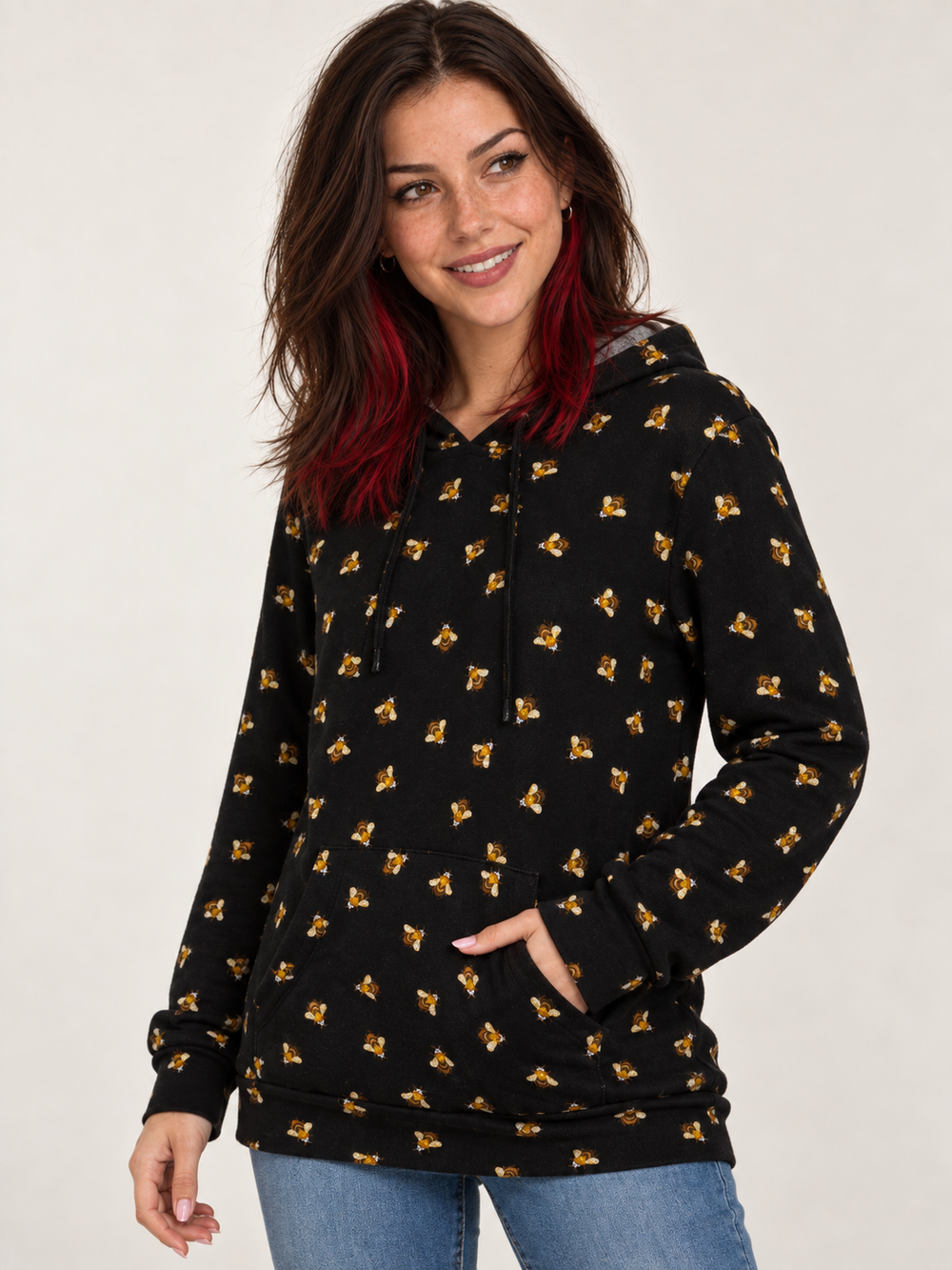 Model wearing Bee Hoodie, angled view