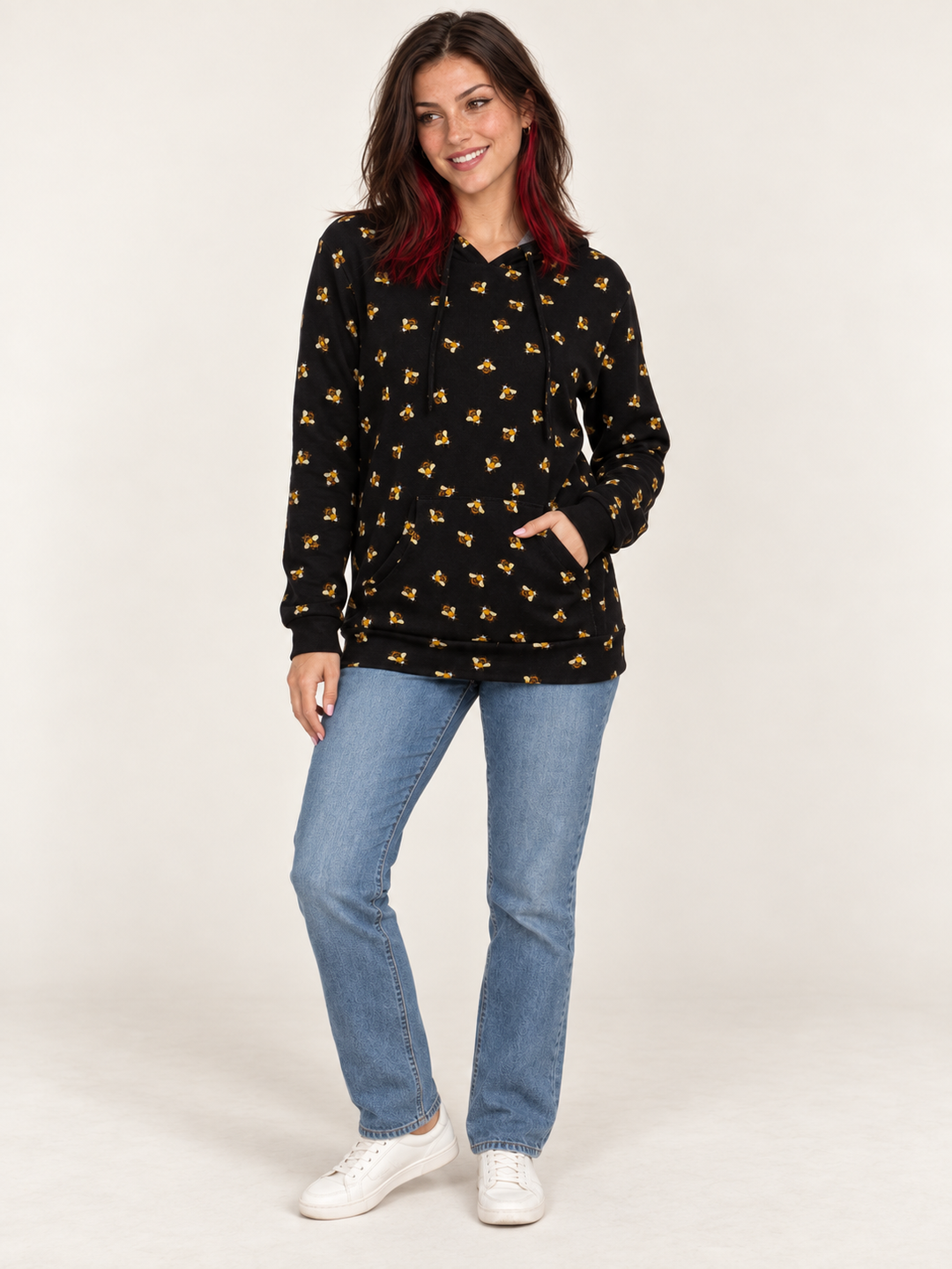 Model wearing Bee Hoodie, full-body view