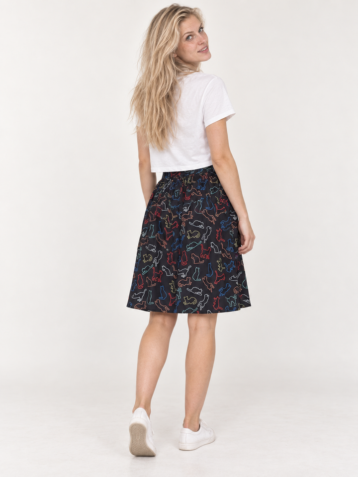 Model wearing the Black Cat Skirt, full-body back view
