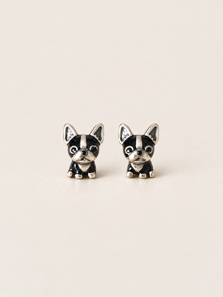 Black Dog Stud Earrings shown on a warm neutral background