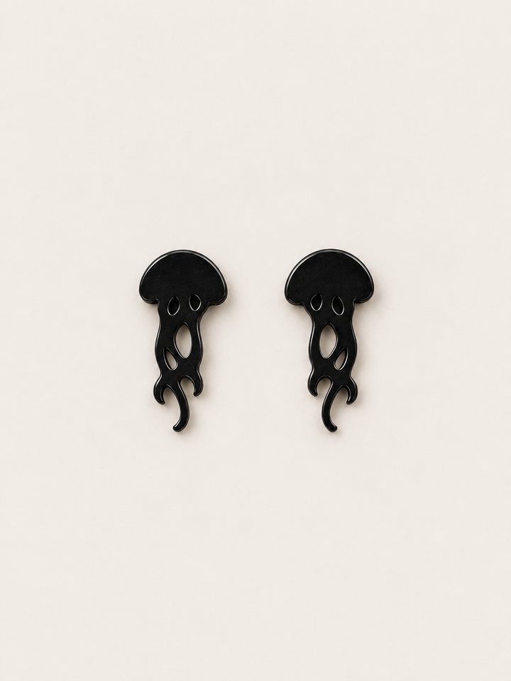 Black Jellyfish Stud Earrings shown on a warm neutral background
