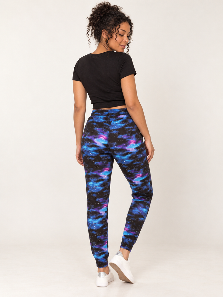 Model wearing Blue Galaxy Joggers, full-body back view