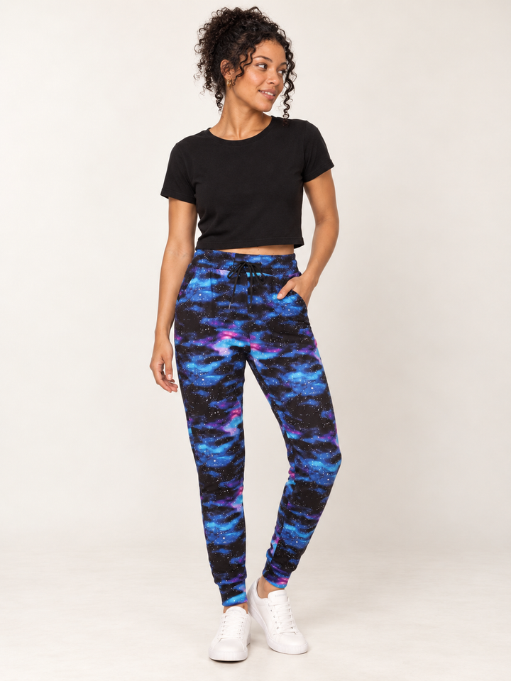 Model wearing Blue Galaxy Joggers, full-body front view