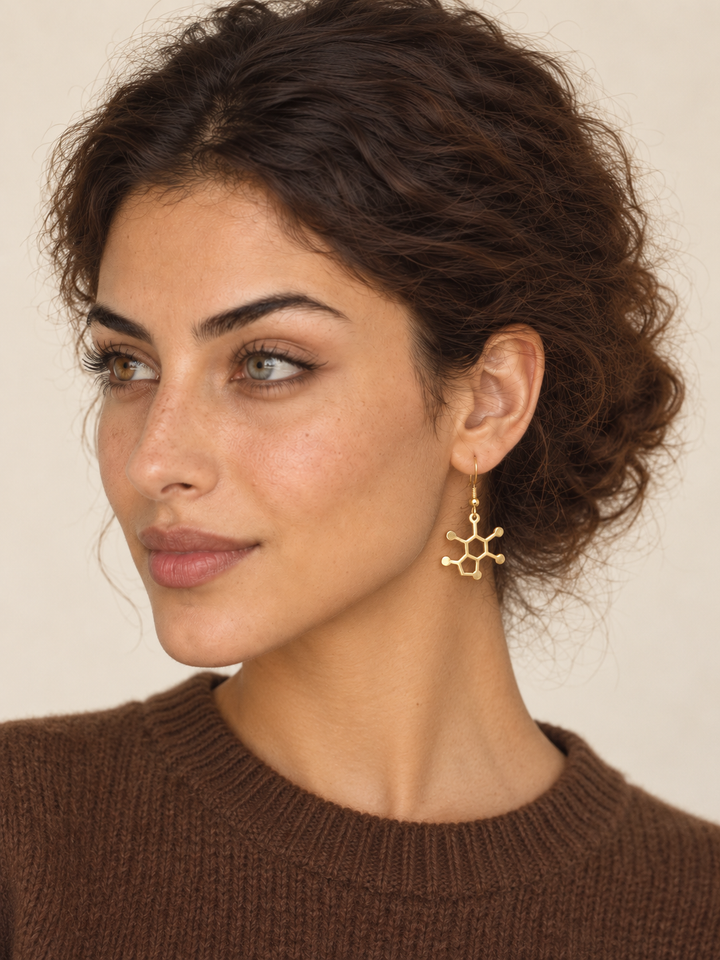 Model wearing Gold Caffeine Molecule Earrings
