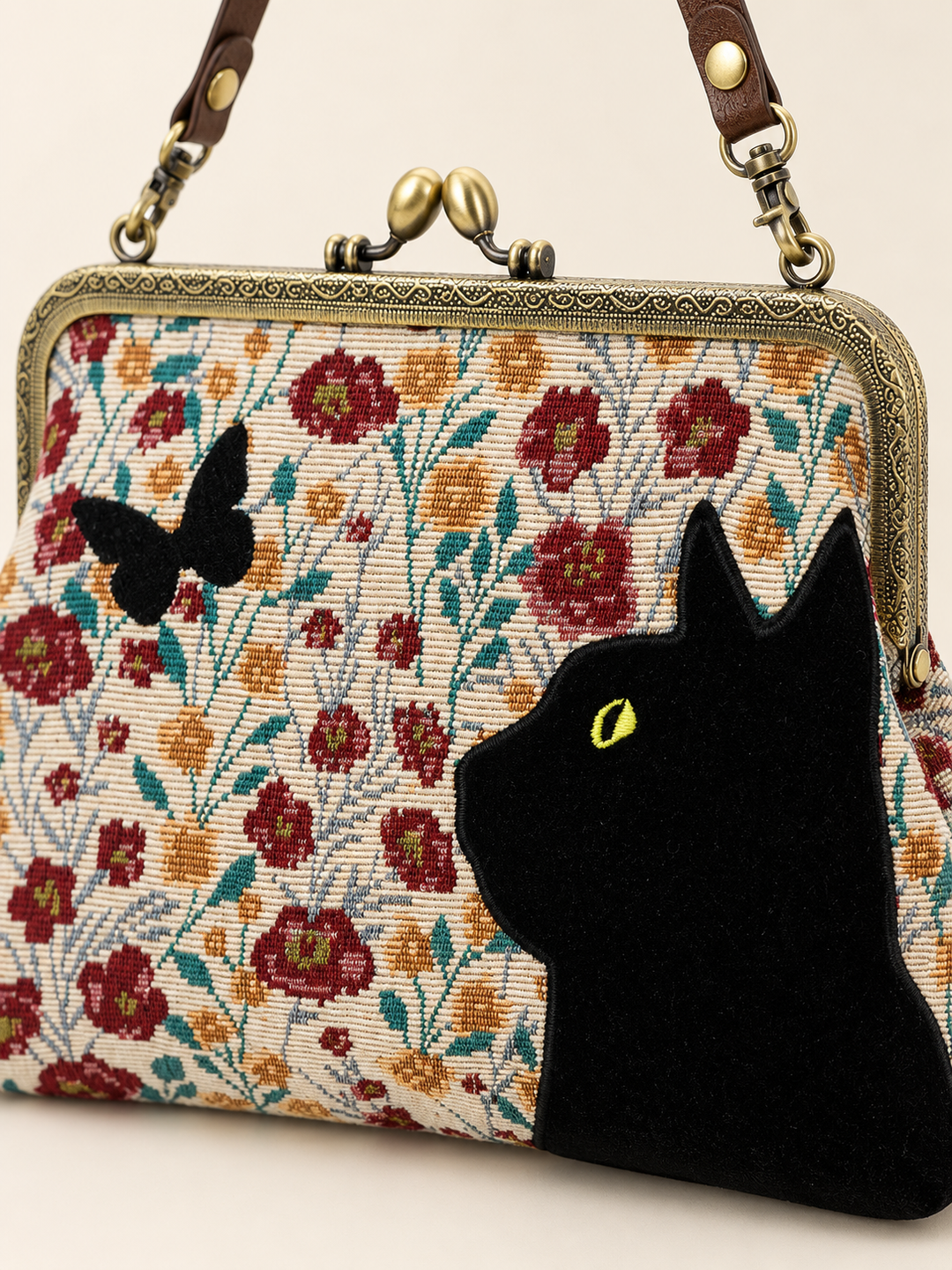 Close-up of Cat Kisslock Bag tapestry and kisslock details