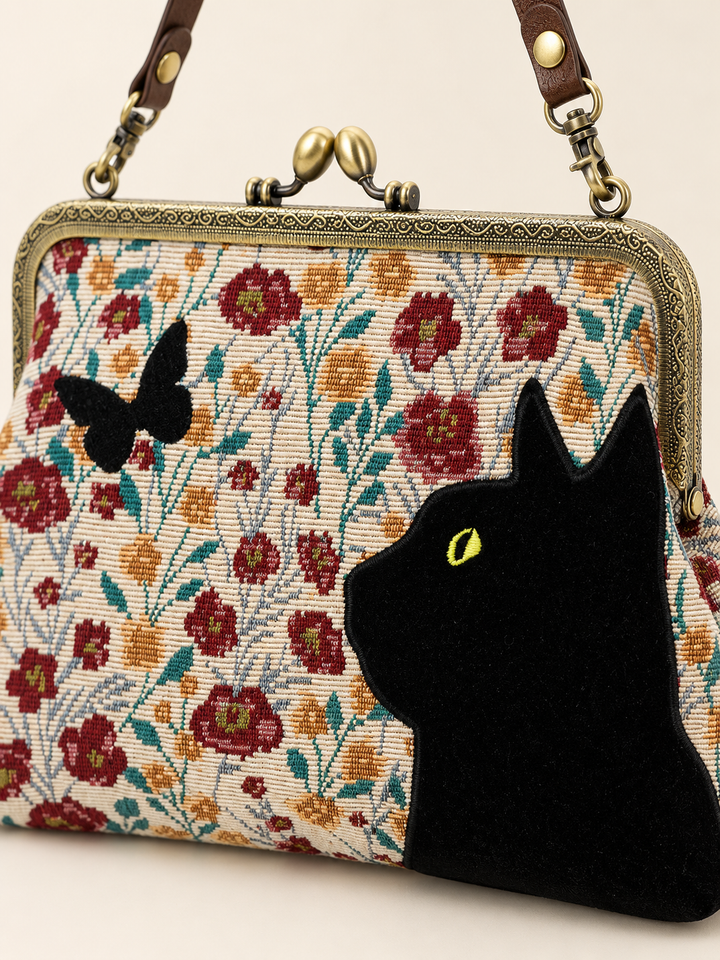 Close-up of Cat Kisslock Bag tapestry and kisslock details
