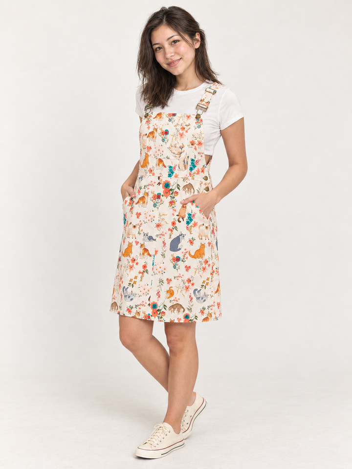 Cat Overall Dress Cream – full-body angled view