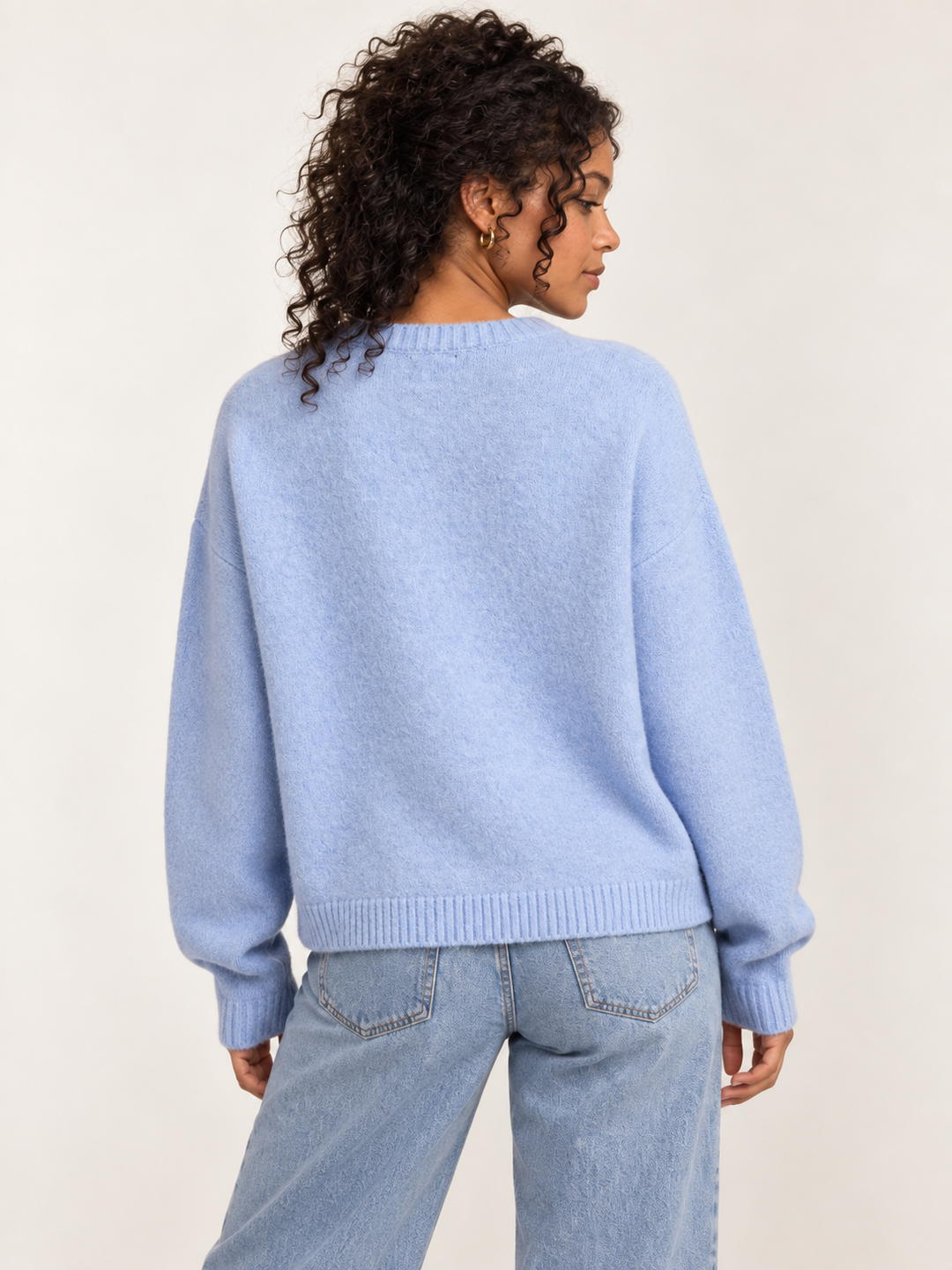 Model wearing Cat Sweater Blue, back view