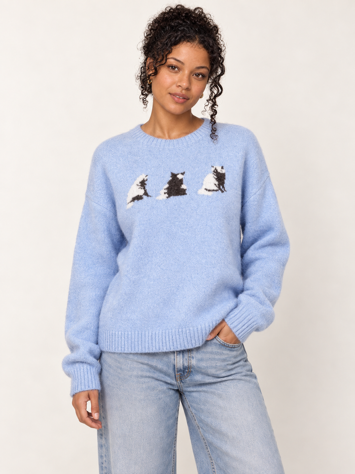 Model wearing Cat Sweater Blue, front view