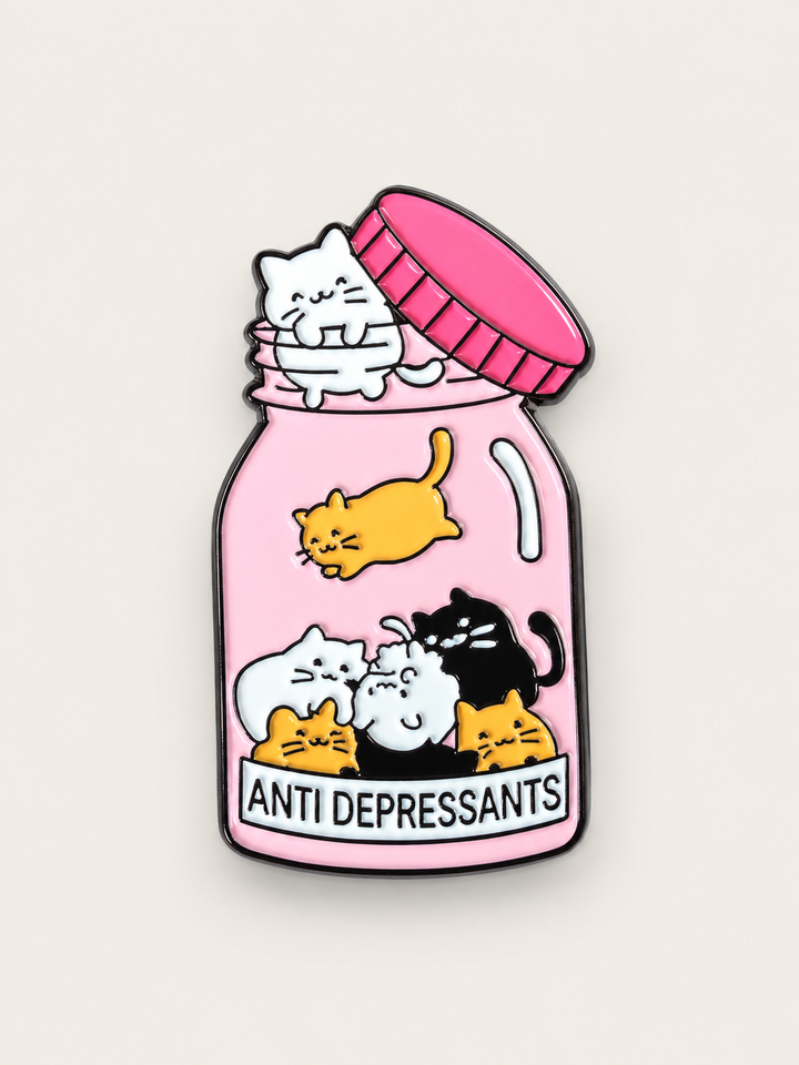 Cats Antidepressants Bottle Pin shown on a warm neutral background