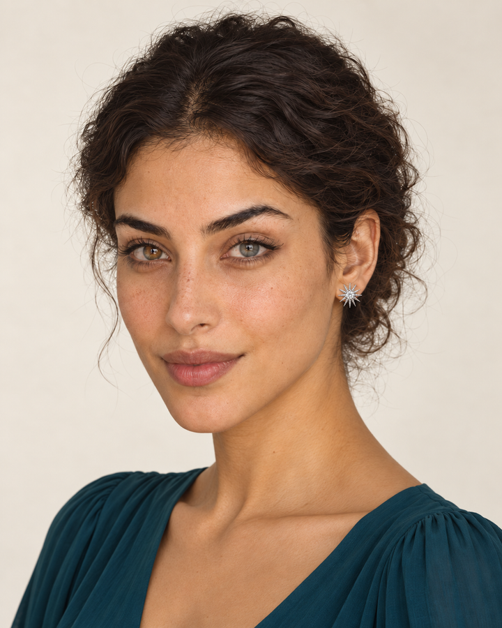 Model wearing the silver starburst earring on her right ear