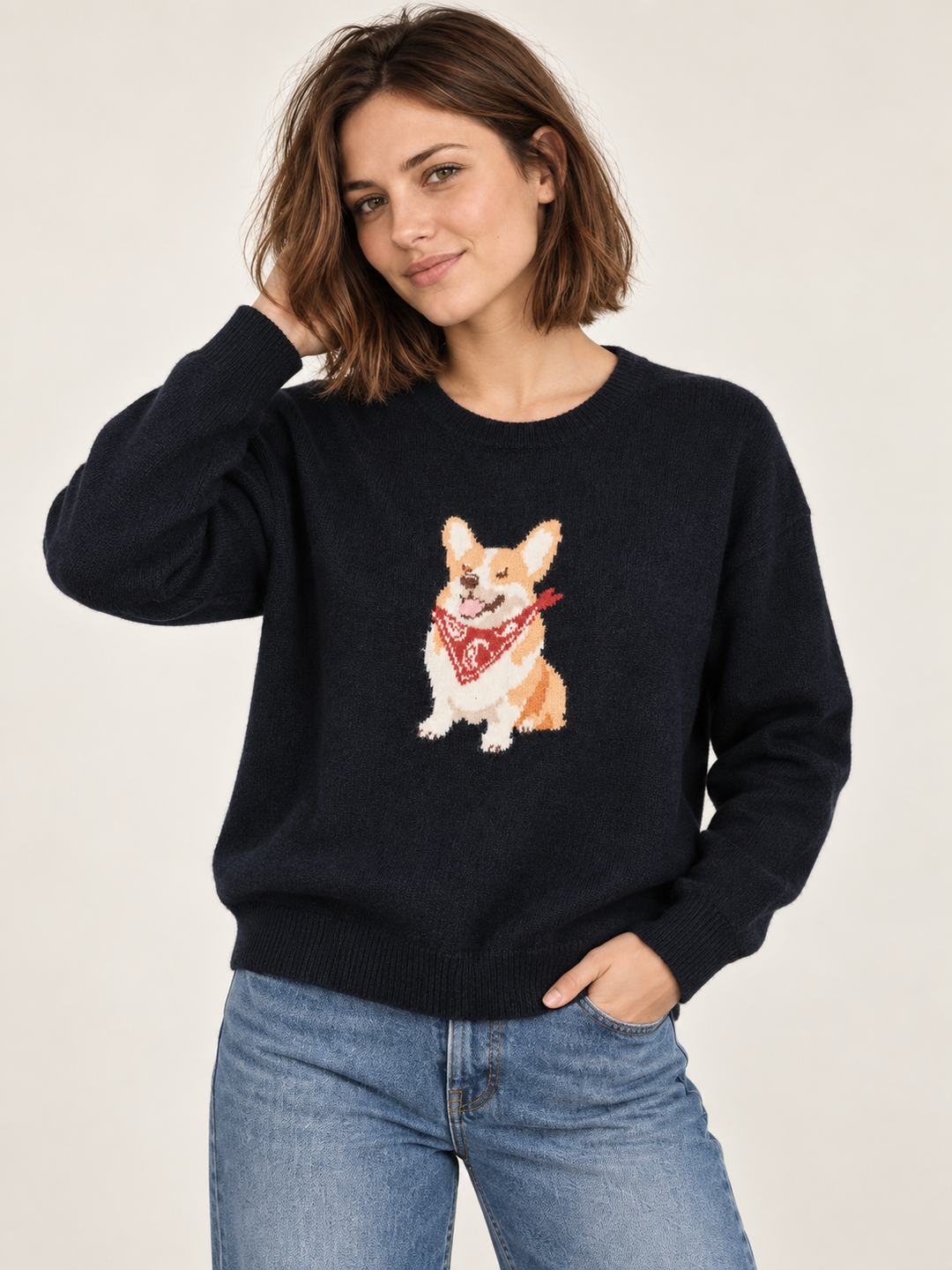 Model wearing Corgi Bandana Sweater in navy, front view