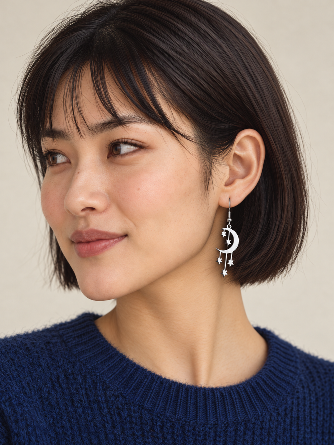 Model wearing silver Crescent Moon and Stars Drop Earrings