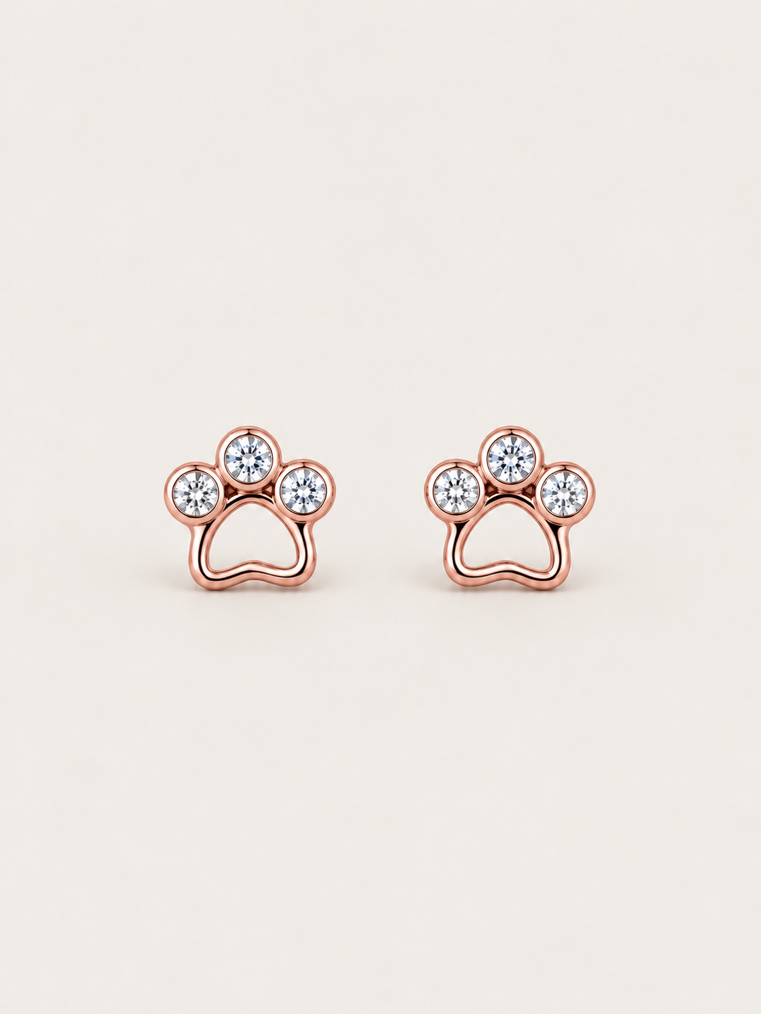 Crystal Paw Print Stud Earrings — Rose Gold front view