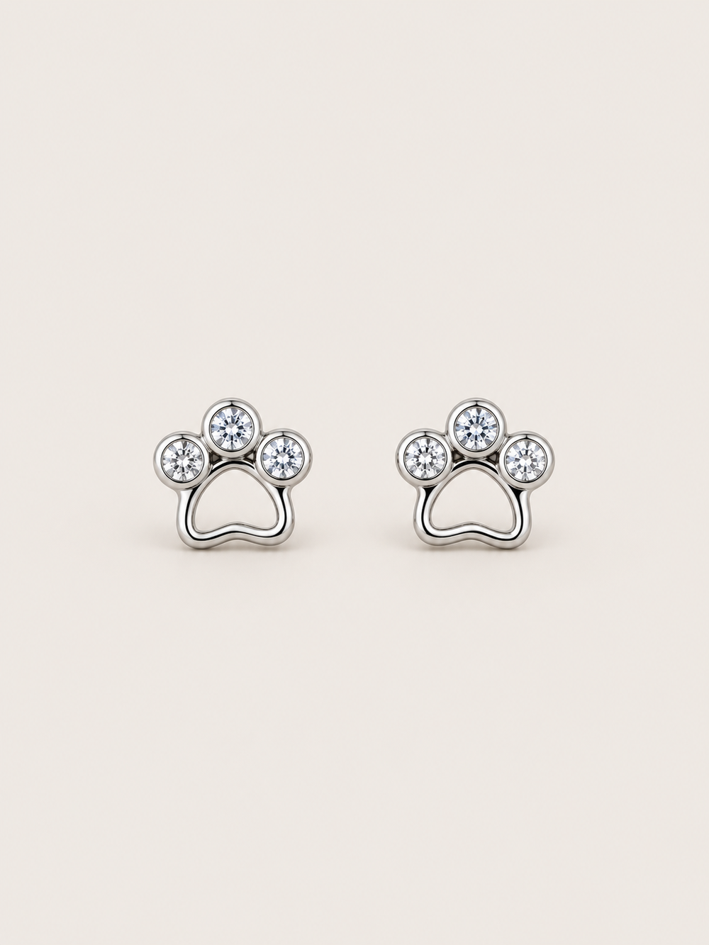 Crystal Paw Print Stud Earrings — Silver front view
