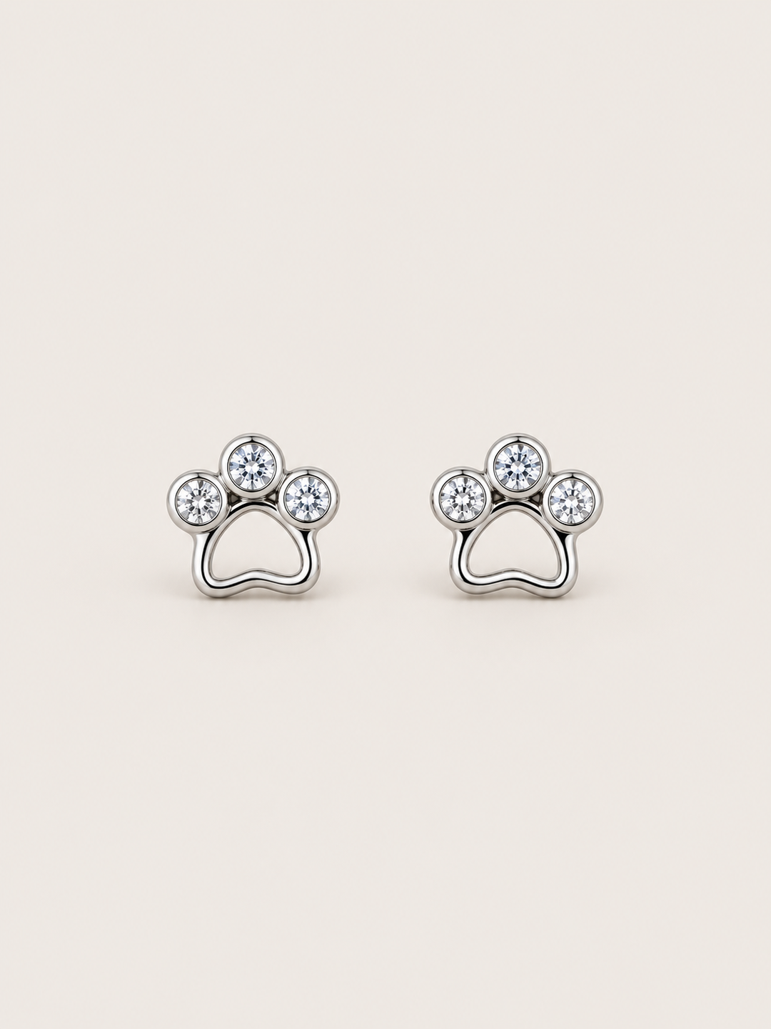 Crystal Paw Print Stud Earrings — Silver front view
