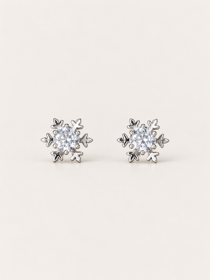 Crystal Snowflake Stud Earrings shown on a warm neutral background