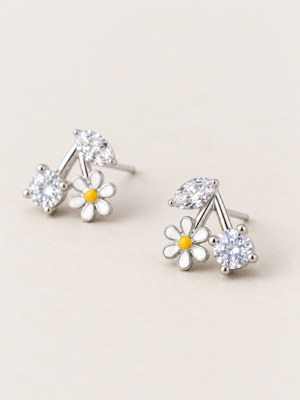 Daisy Crystal Stud Earrings shown angled on a warm neutral background