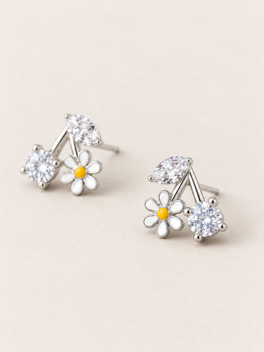 Daisy Crystal Stud Earrings shown angled on a warm neutral background