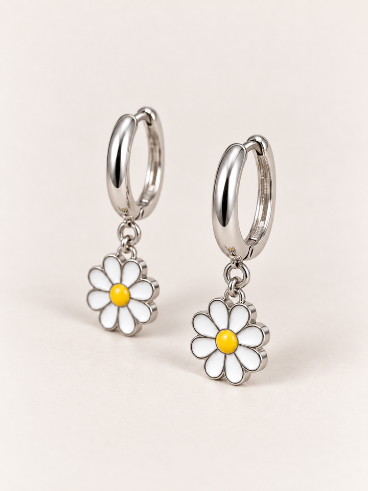 Daisy Hoop Earrings shown at an angle on a warm neutral background