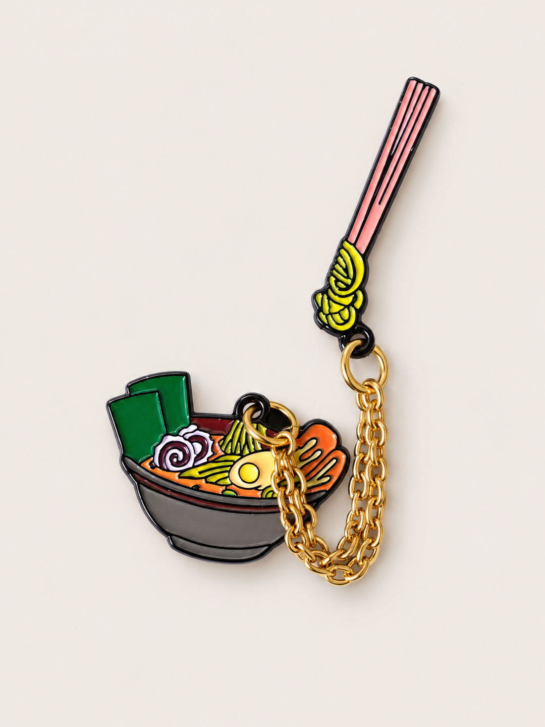 Dangling Ramen Bowl Pin shown on a warm neutral background