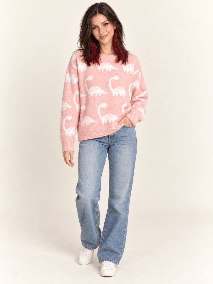 Model wearing pink brontosaurus sweater, full body view