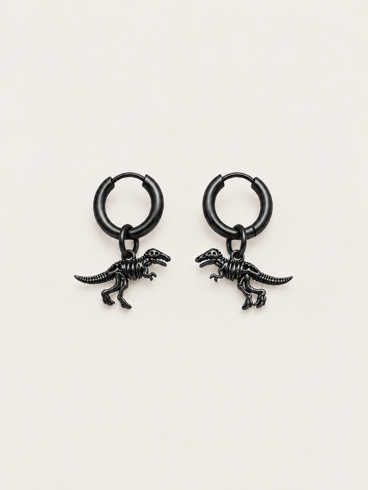 Dinosaur Skeleton Hoop Earrings — black main on a warm neutral background
