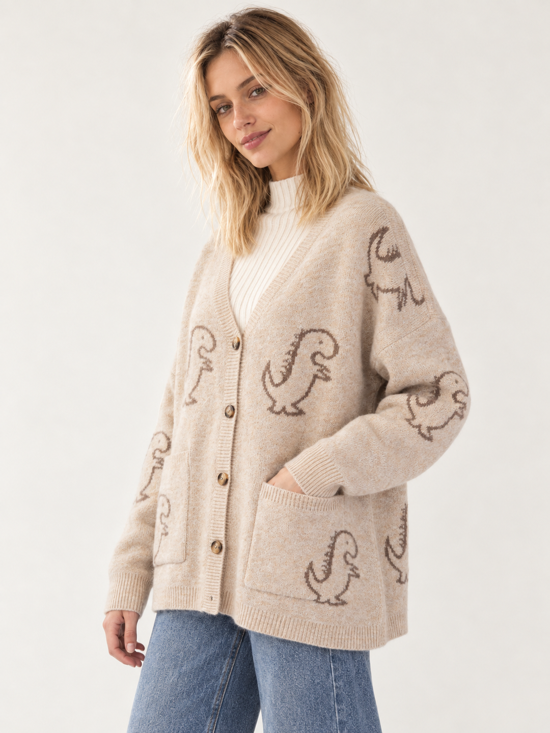 Dinosaur Tan Cardigan 45-degree view on model