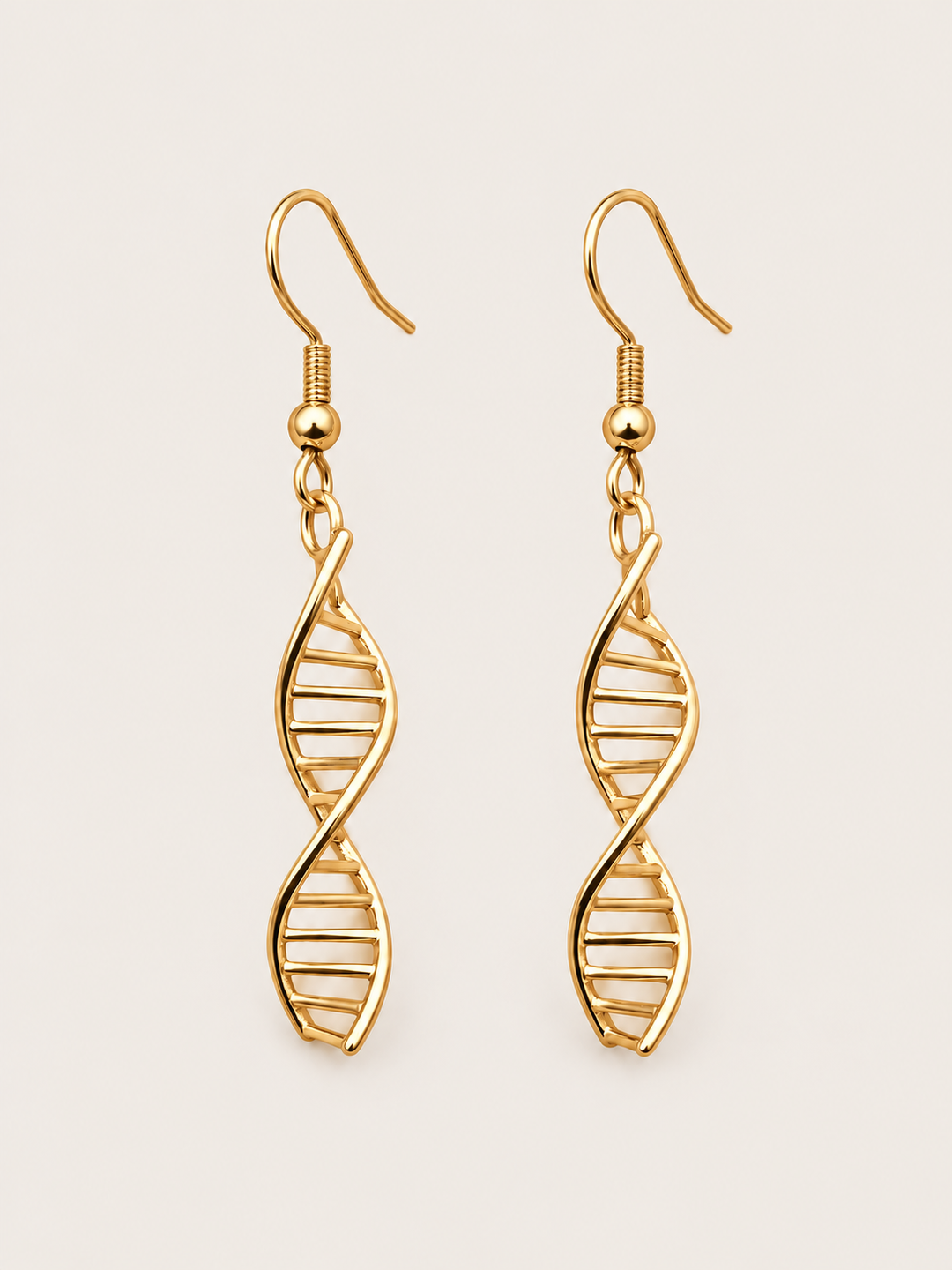 Gold DNA Double Helix Earrings shown on a warm neutral background