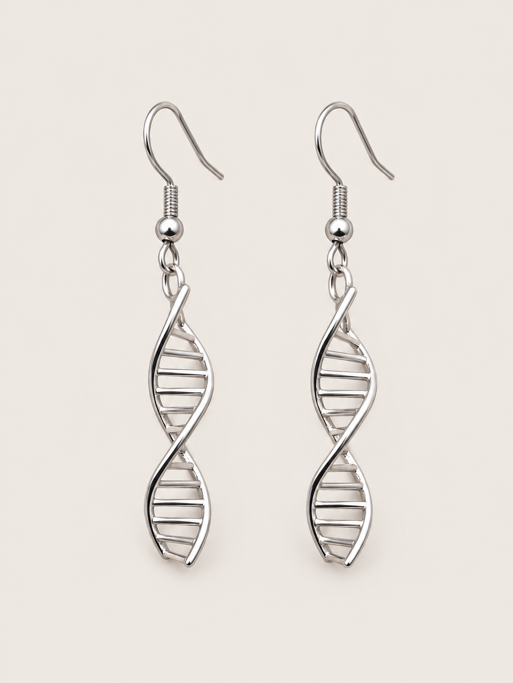 Silver DNA Double Helix Earrings shown on a warm neutral background