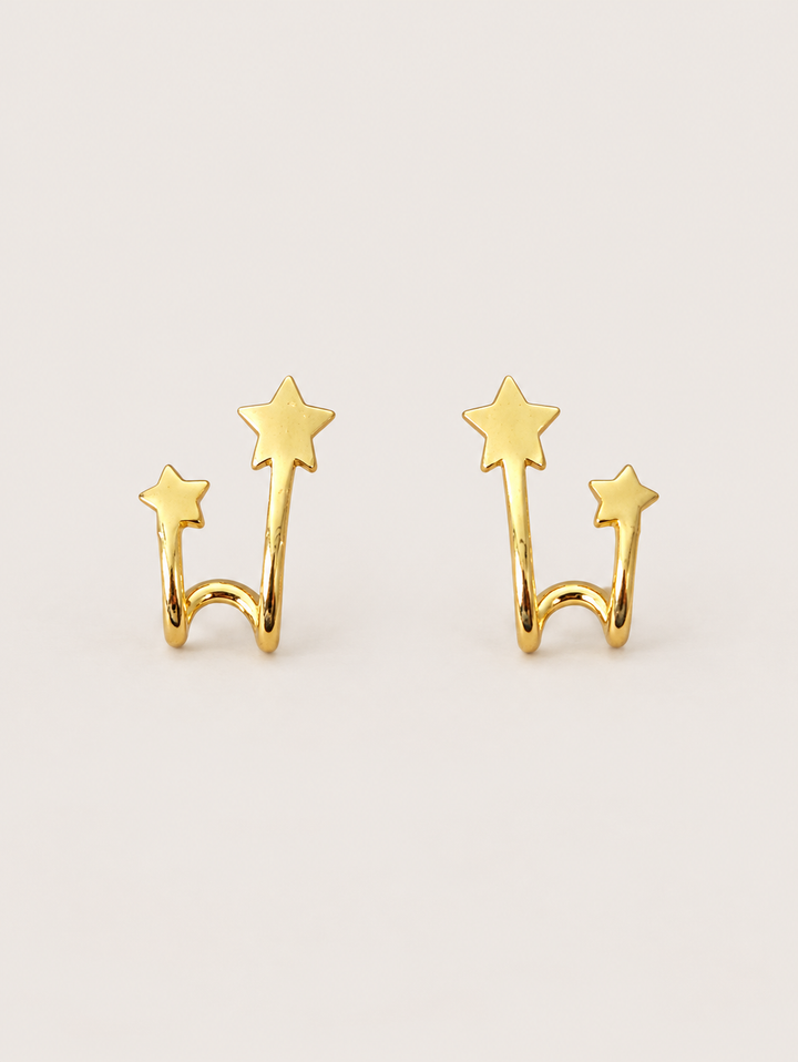 Double Star Wrap Earrings shown on a warm neutral background