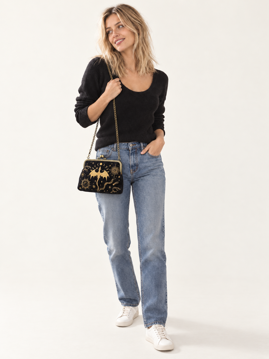 Model wearing the Dragon Kisslock Bag at the hip with its chain strap