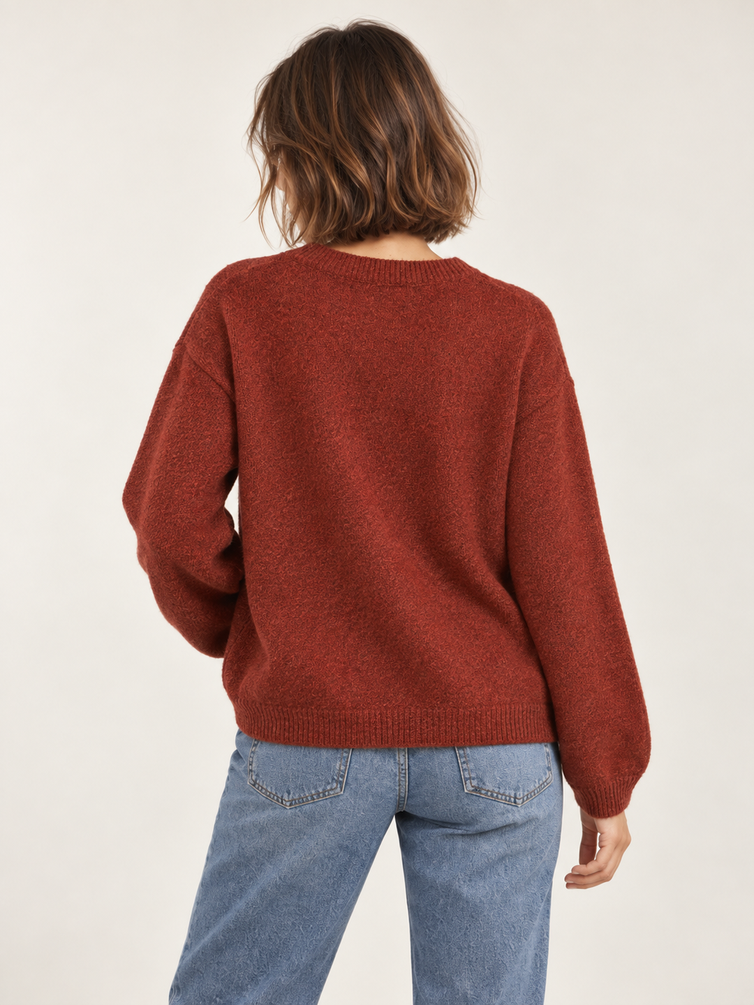 Model wearing Dragonfly Embroidered Sweater Rust — back view