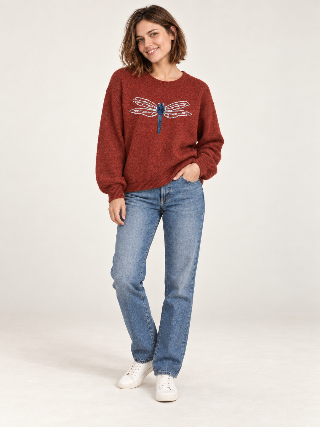 Model wearing Dragonfly Embroidered Sweater Rust — full-body front view