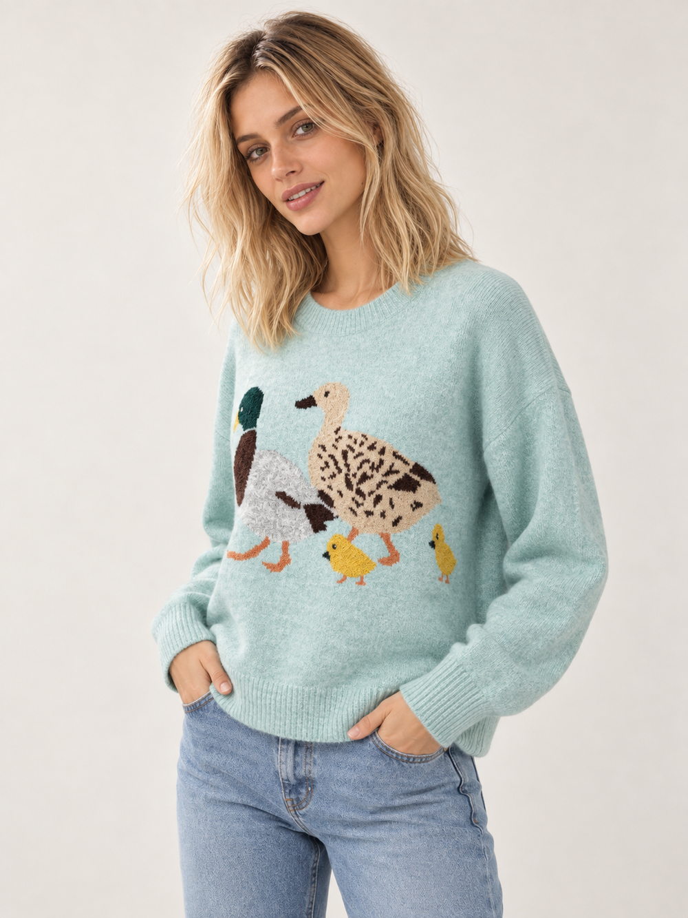 Duck Family Sweater Green angled view on model