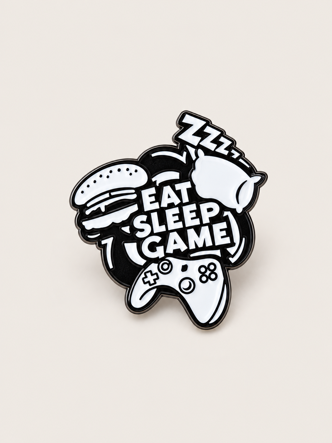 Eat Sleep Game Controller Pin shown on a warm neutral background