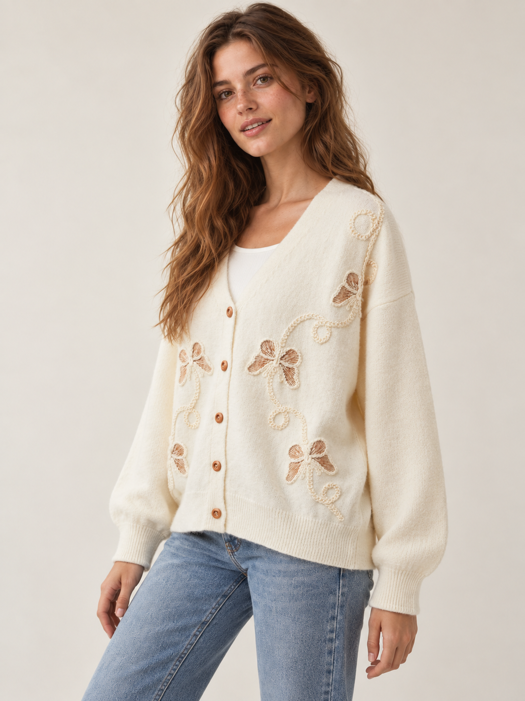 Embroidered butterfly cardigan three-quarter view