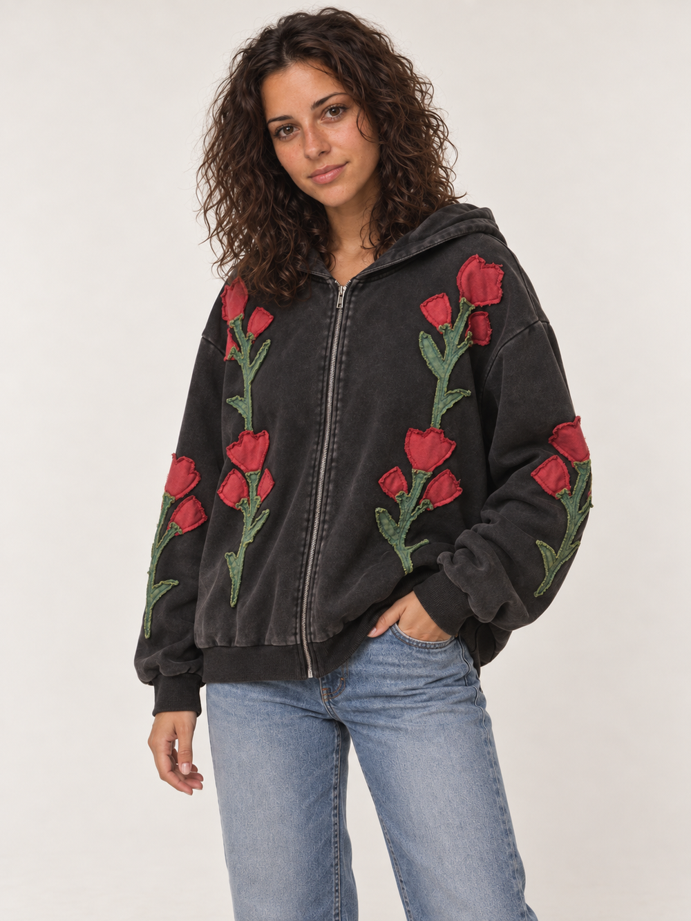 Embroidered floral patchwork zip-up hoodie three-quarter view