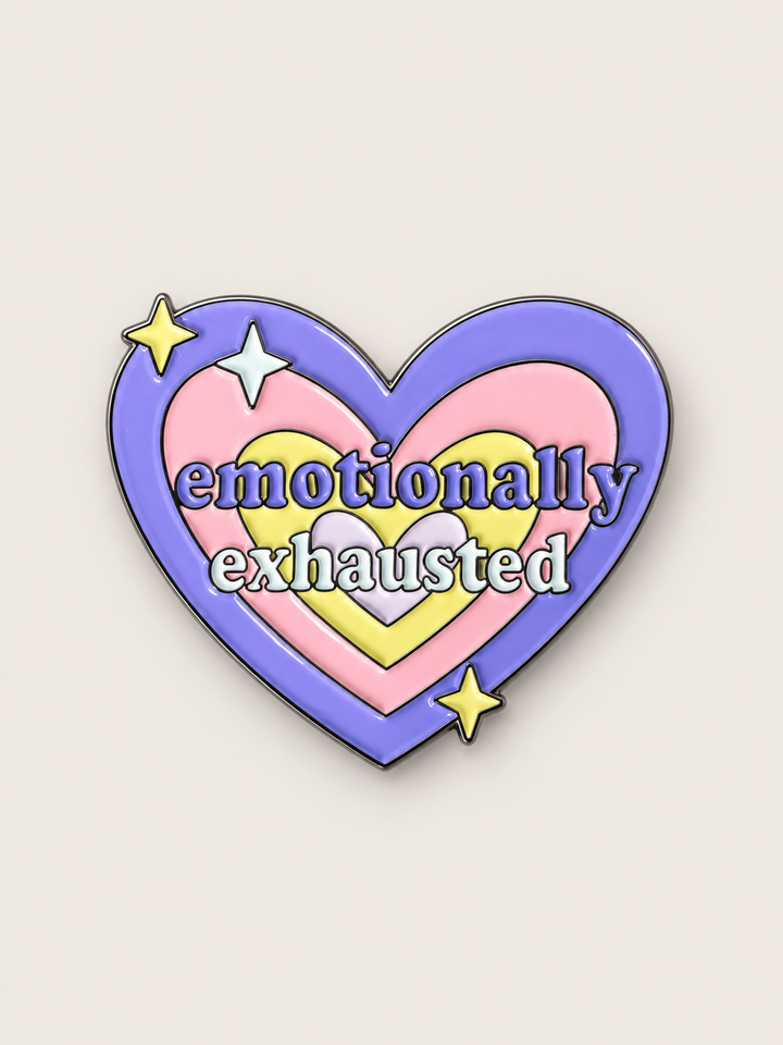 Emotionally Exhausted Heart Pin shown on a warm neutral background