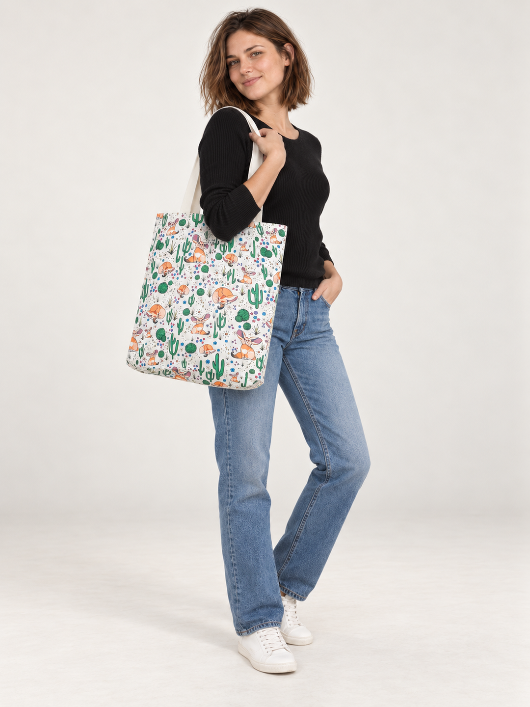 Model wearing the Fennec Fox Tote Bag over her shoulder